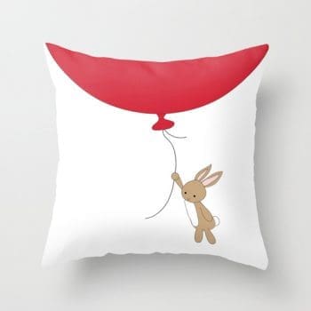 Nursery cushion - Easter Gift. Cute bunny hanging from a balloon