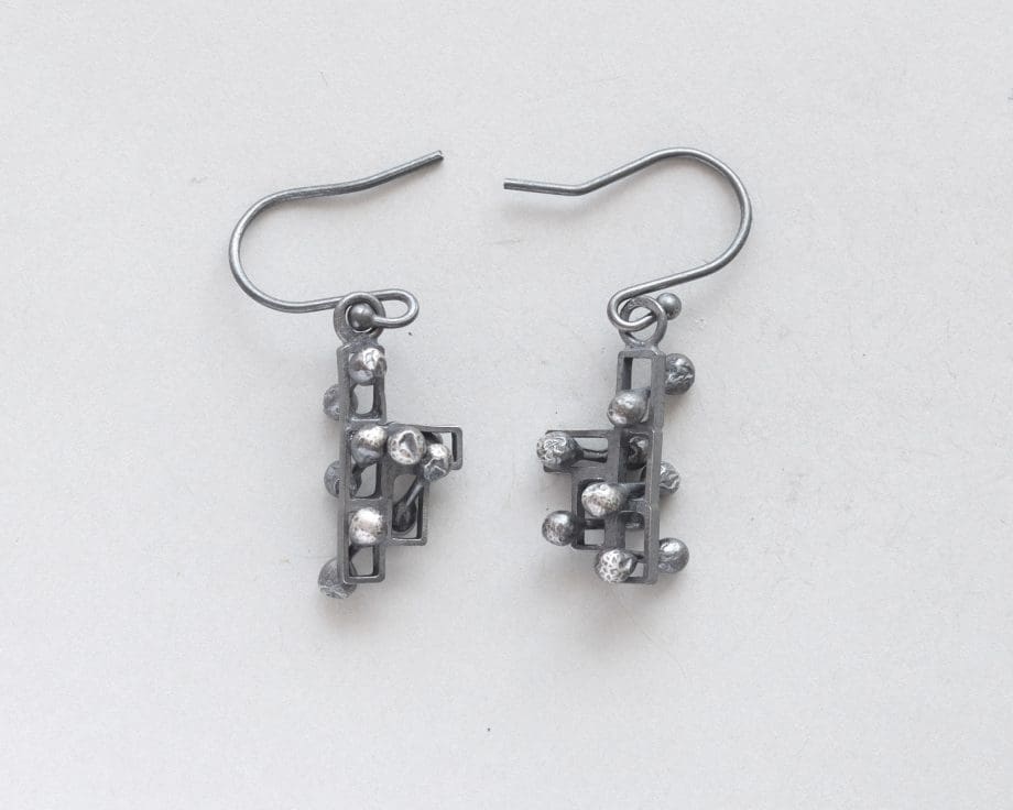 Kinetic small silver drop earrings