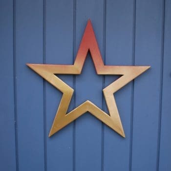 Gold and red painted wooden star wreath