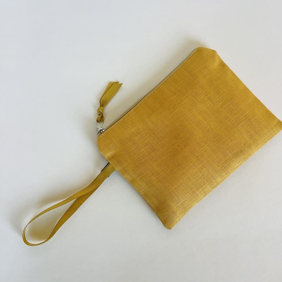 Linen Zip-Up Pouch - curry yellow with peacock feathers motif